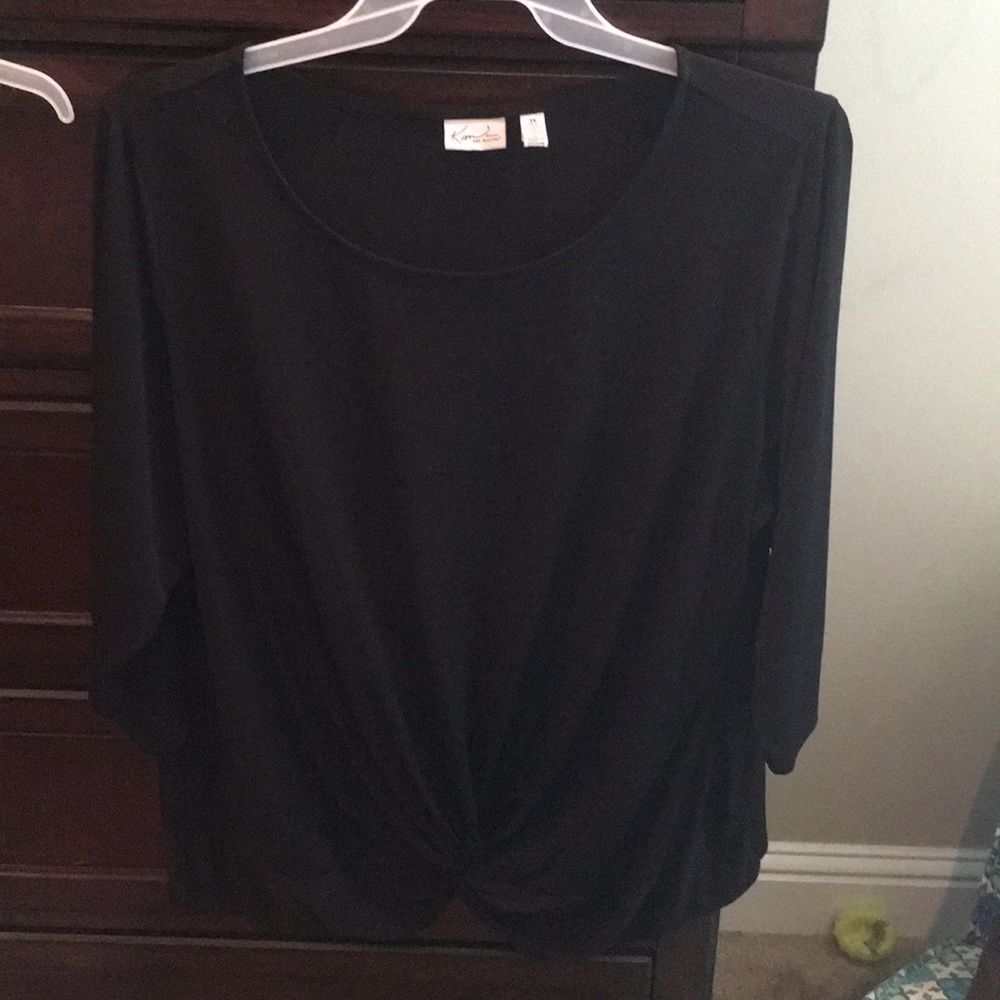 Kim Rogers black shirt